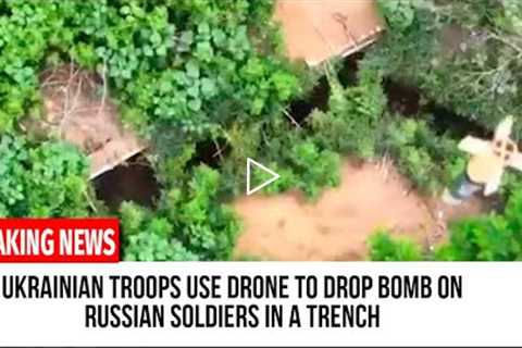 Ukrainian troops use drone to drop bomb on Russian soldiers in a trench