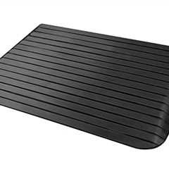 Solid rubber threshold ramp for mobility devices