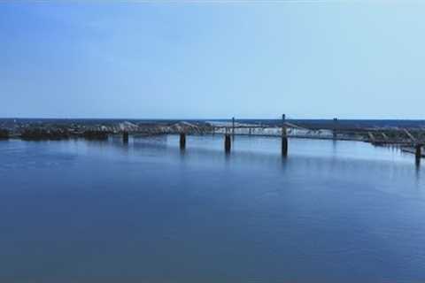 Ohio river tour between Jeffersonville, Indiana and Louisville, Kentucky. Drone footage state line.